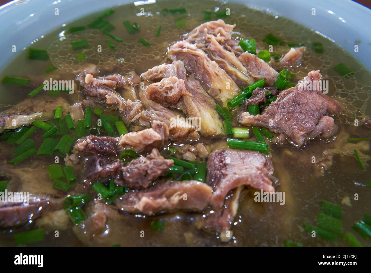 A bowl of delicious and fragrant Cantonesestyle clear soup beef