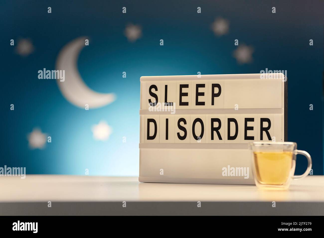 light box with sleep disorder words and cup of tea Stock Photo Alamy