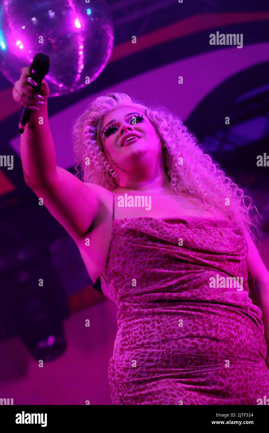 Kitty ScottClaus is a British drag performer most known for competing on the third series of