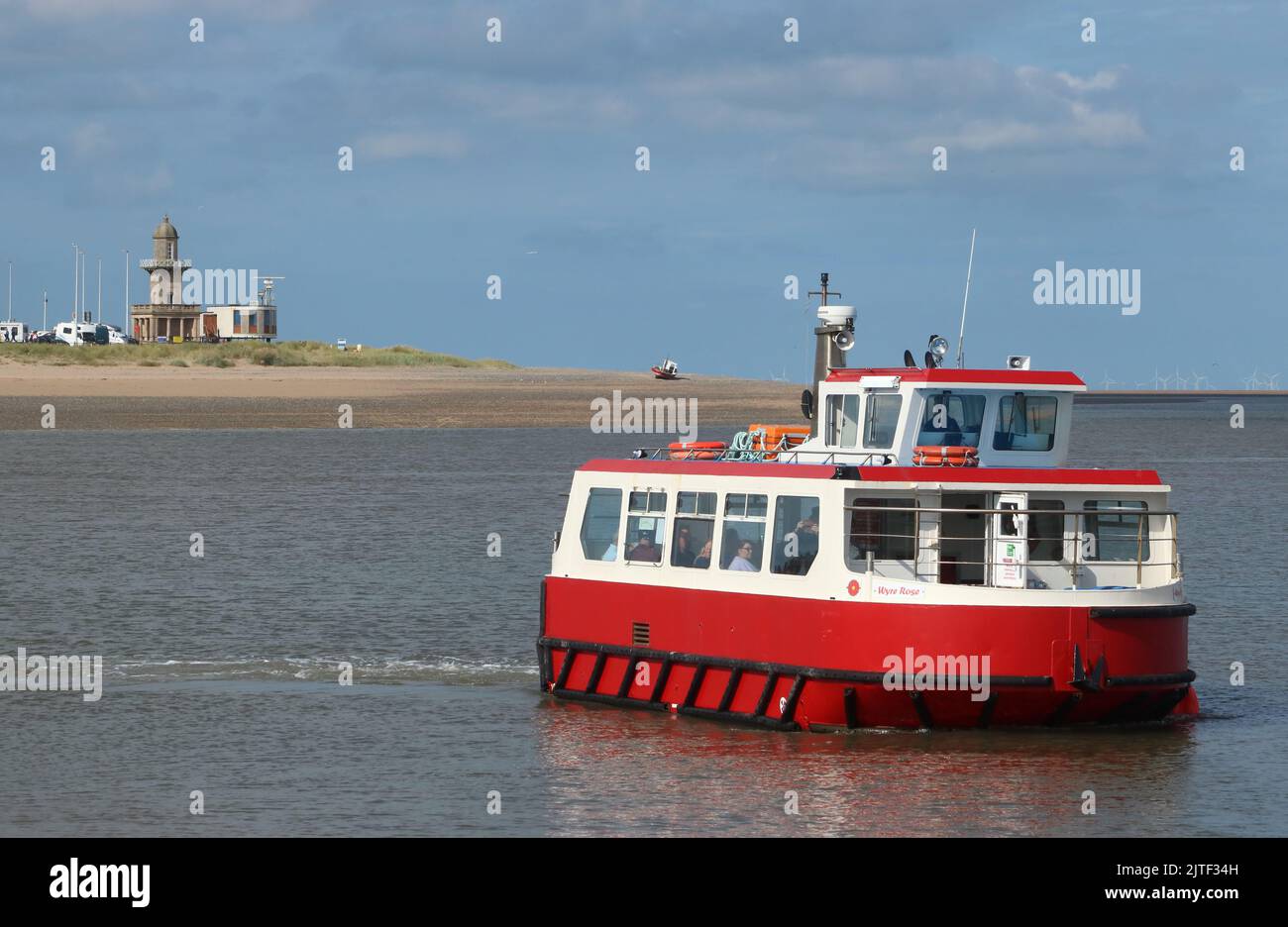 Wyre Rose, Knott End to Fleetwood passenger ferry crossing River Wyre, Lancashire seen from Knott End ferry slip on 29th August 2022. Stock Photo
