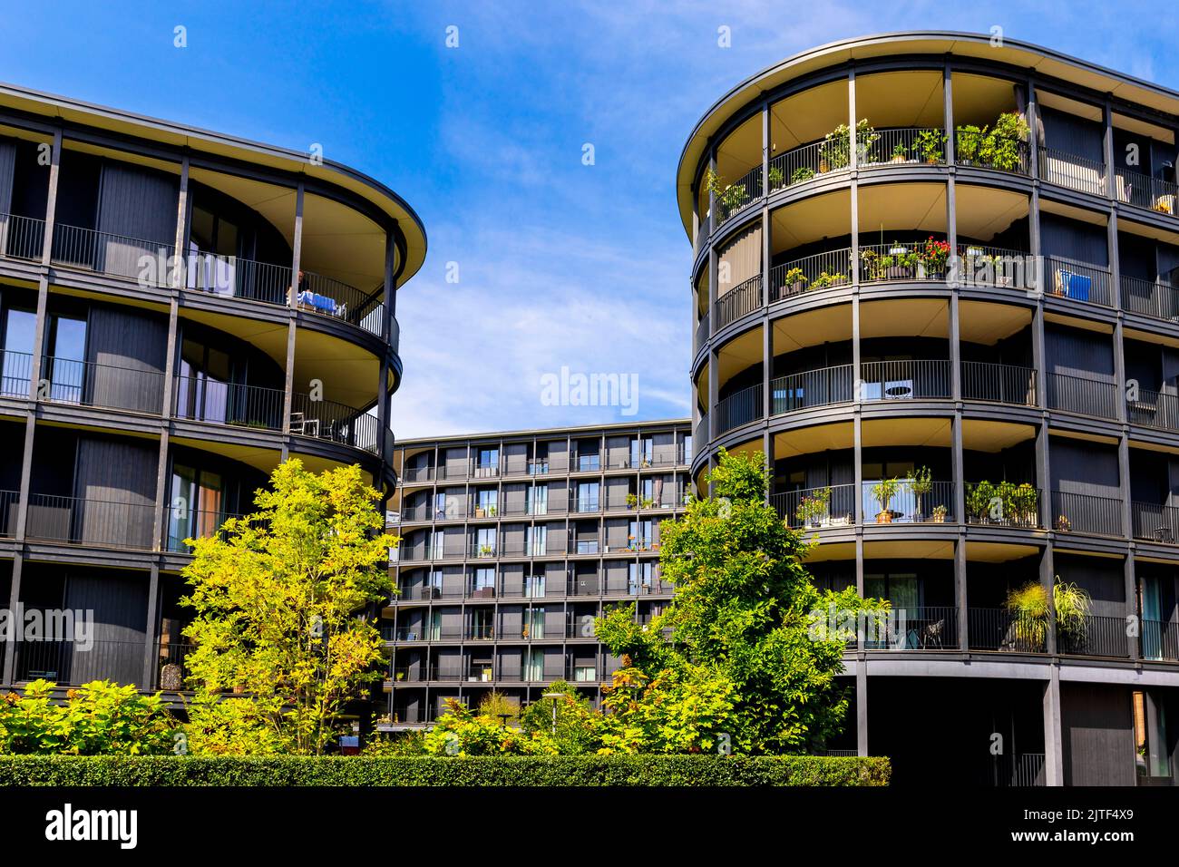 Modern residential buildings at on the Rhine promenade in Basel city centre, Switzerland. Stock Photo