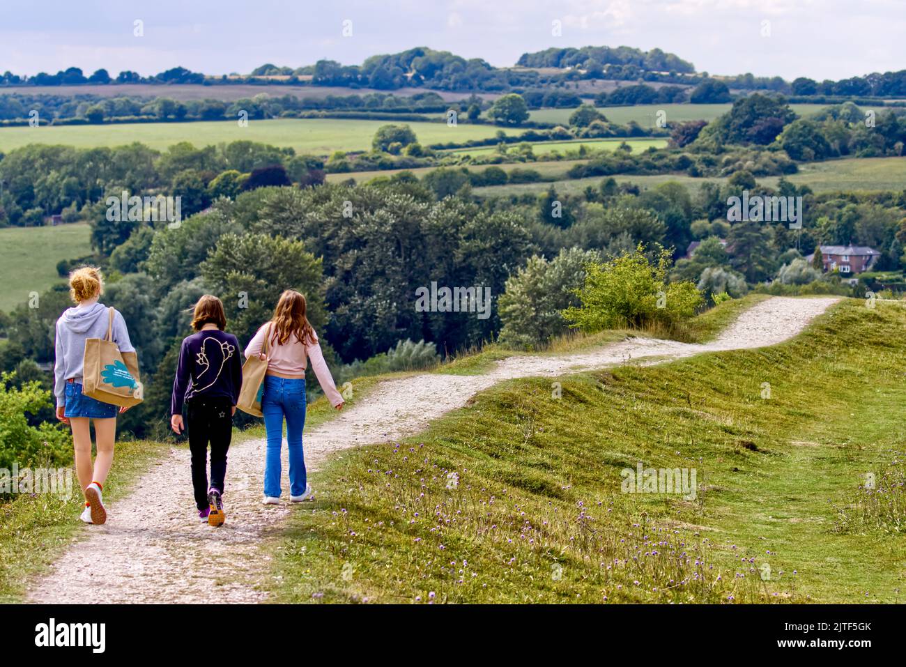 Children walking along the path at St Catherine's Hill, Winchester Stock Photo