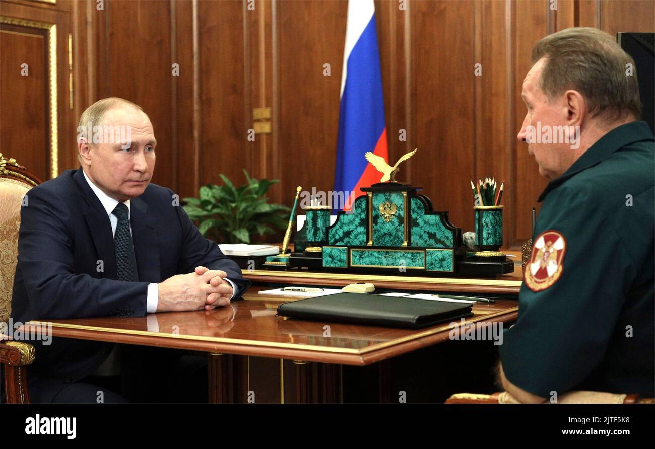 Moscow, Russia. 30th Aug, 2022. Russian President Vladimir Putin holds a face-to-face meeting with the Director of the Federal Service of National Guard Troops Viktor Zolotov, right, at the Kremlin, August 30, 2022 in Moscow, Russia. Credit: Mikhail Klimentyev/Kremlin Pool/Alamy Live News Stock Photo