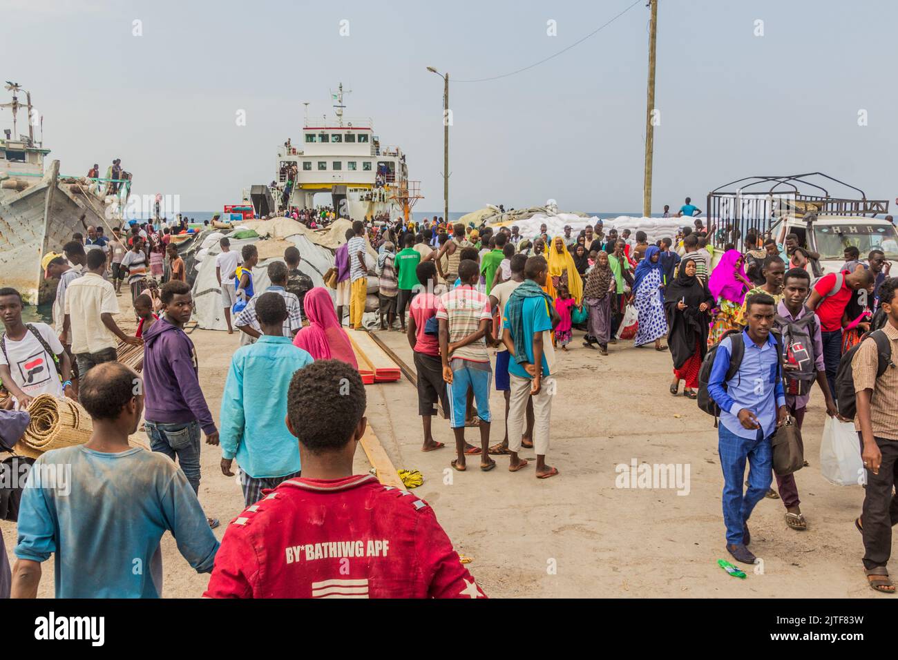 TADJOURA, DJIBOUTI - APRIL 20, 2019: Crowds of people leaving a ferry in the port of Tadjoura, Djibouti Stock Photo