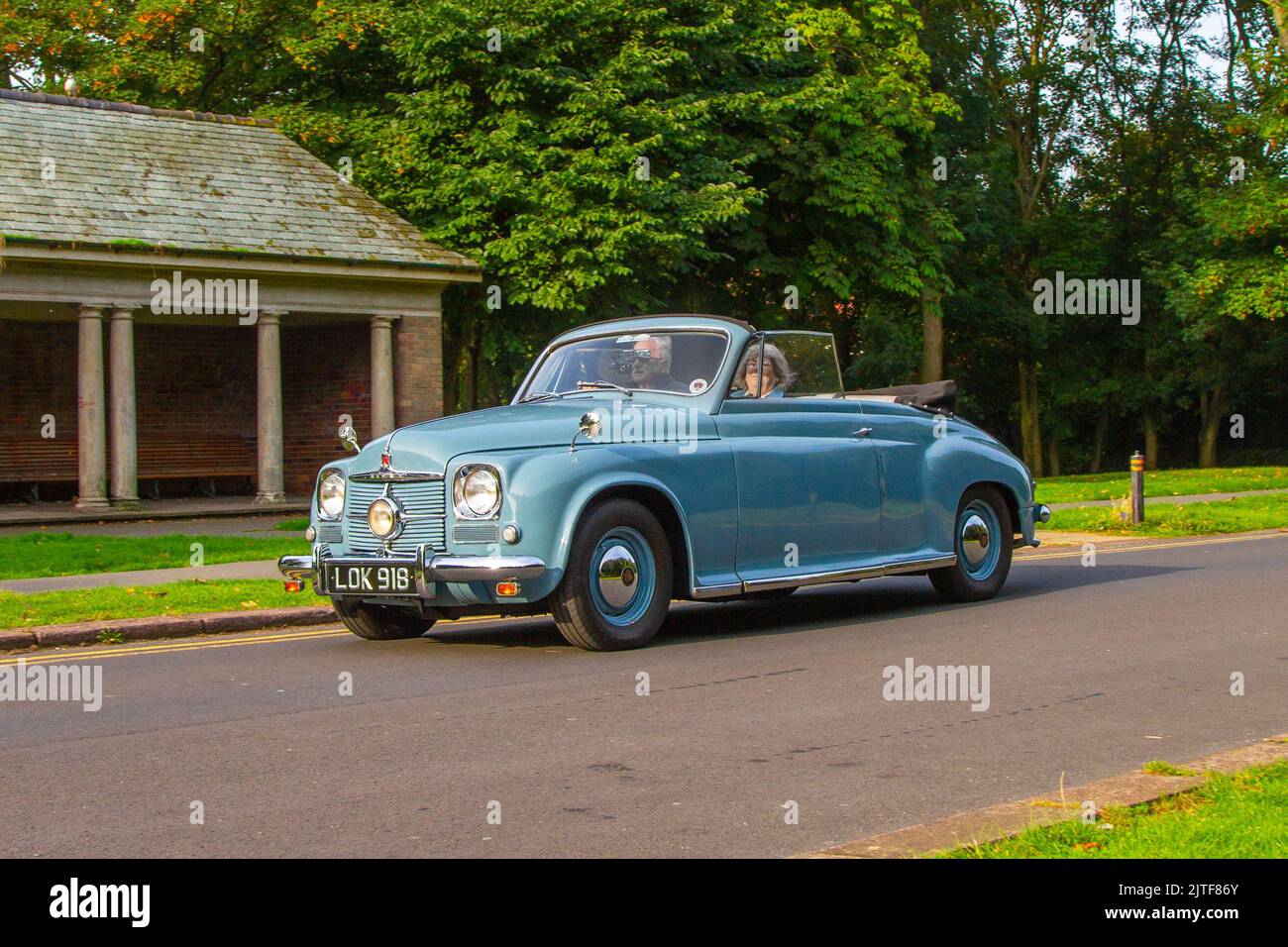 1951 50s fifties Blue  ROVER P4 2638cc Petrol Cabrio; Cars arriving at the annual Stanley Park Classic Car Show. Stanley Park classics yesteryear Motor Show is hosted by Blackpool Vintage Vehicle Preservation Group, UK. Stock Photo