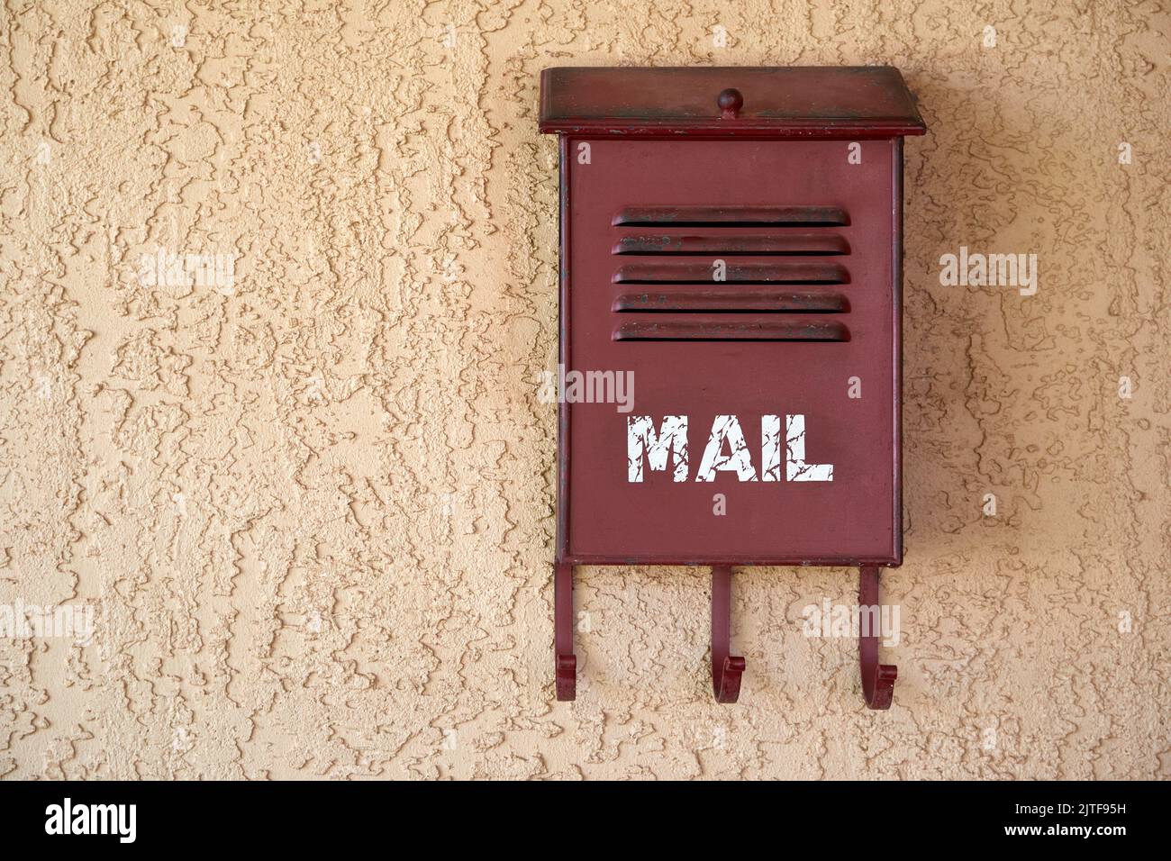 Old mailbox on wall Stock Photo