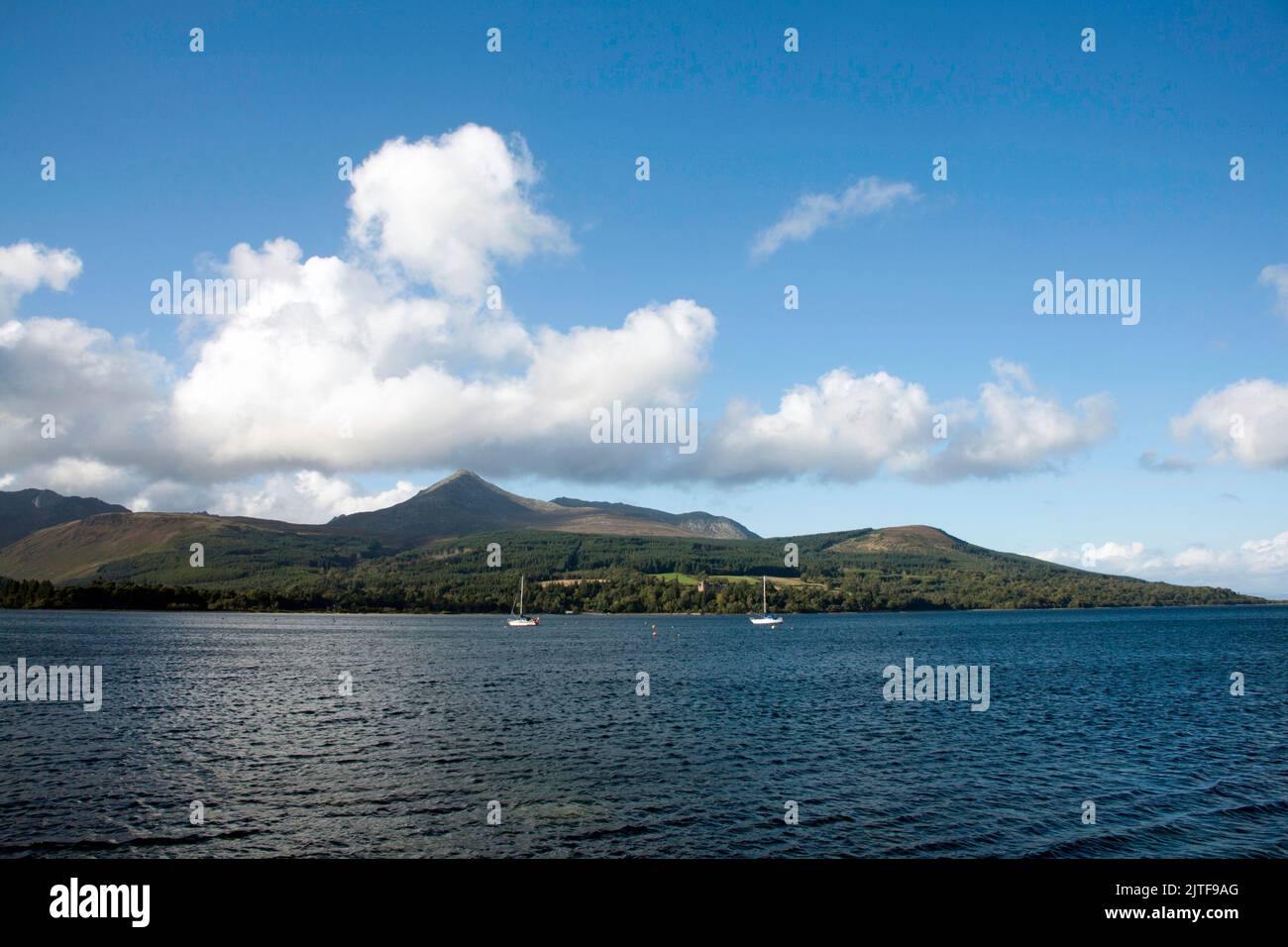 Goat Fell viewed across Brodick Bay Brodick Castle Country Park from Brodick seafront Brodick the Isle of Arran North Ayrshire Scotland Stock Photo