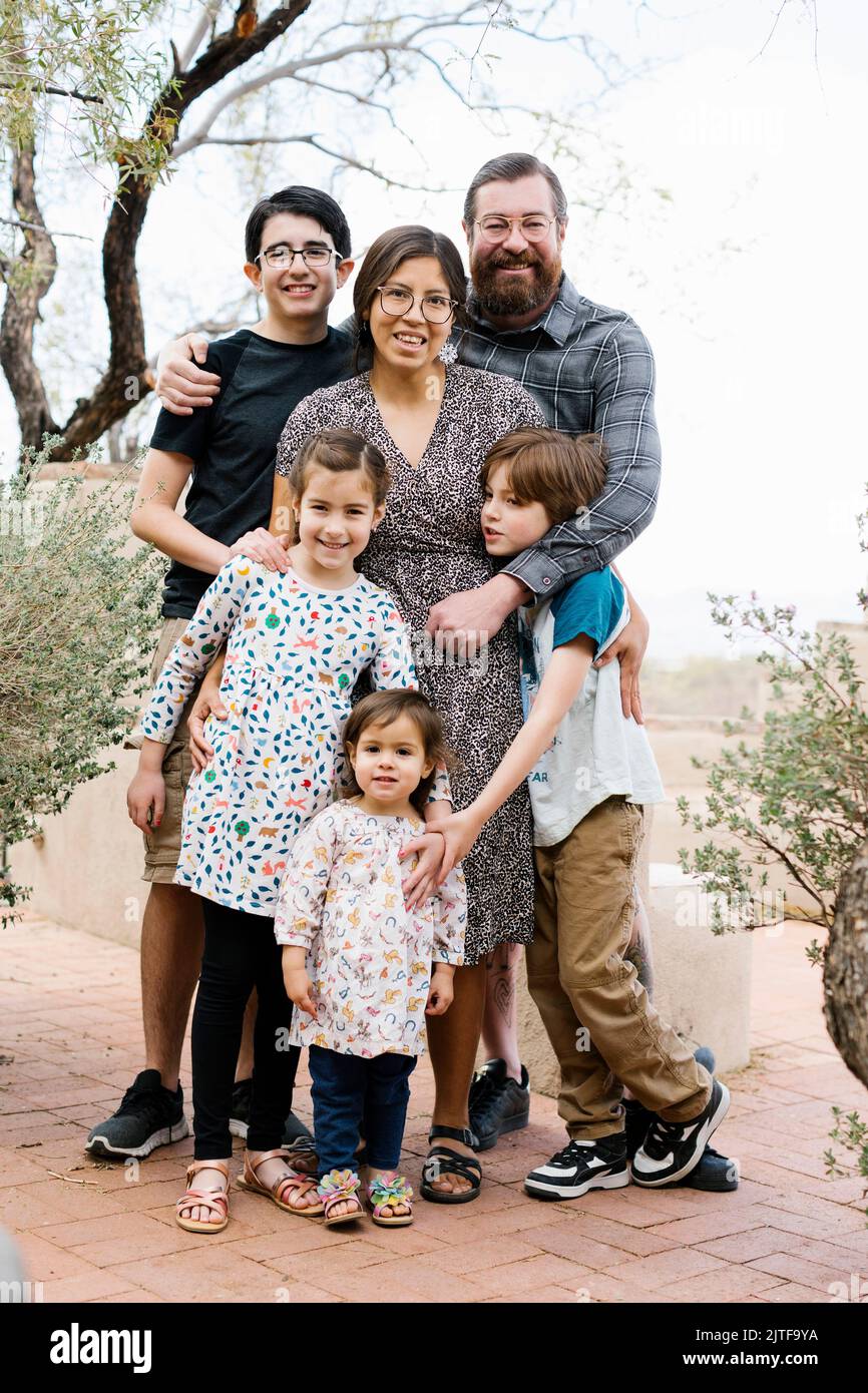 Portrait of family with children (2-3, 8-9, 14-15) Stock Photo