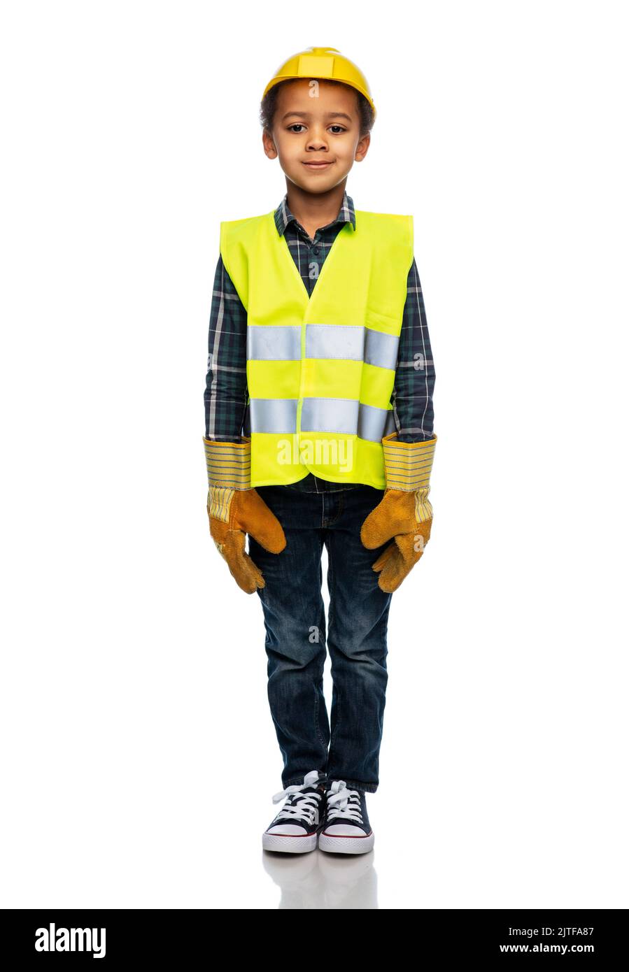 little boy in gloves, safety vest and helmet Stock Photo