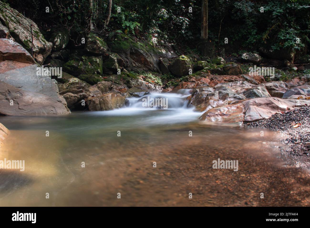 Water flows in a mountain river Stock Photo