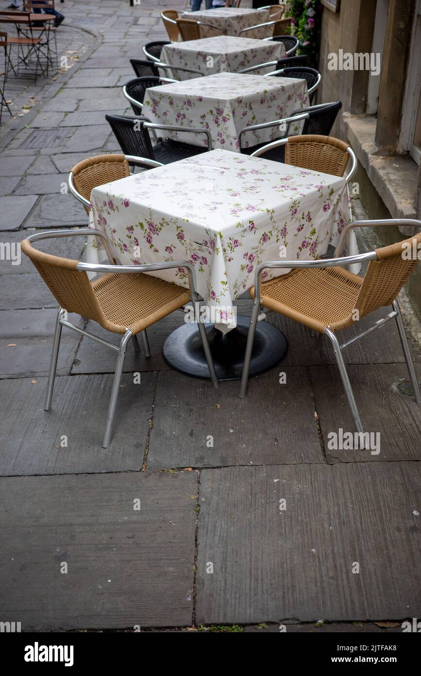 Chairs and tables outside a restaurant in Bath (Aug22 Stock Photo Alamy