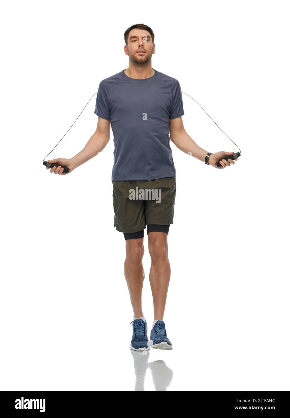 man exercising with jump rope Stock Photo - Alamy