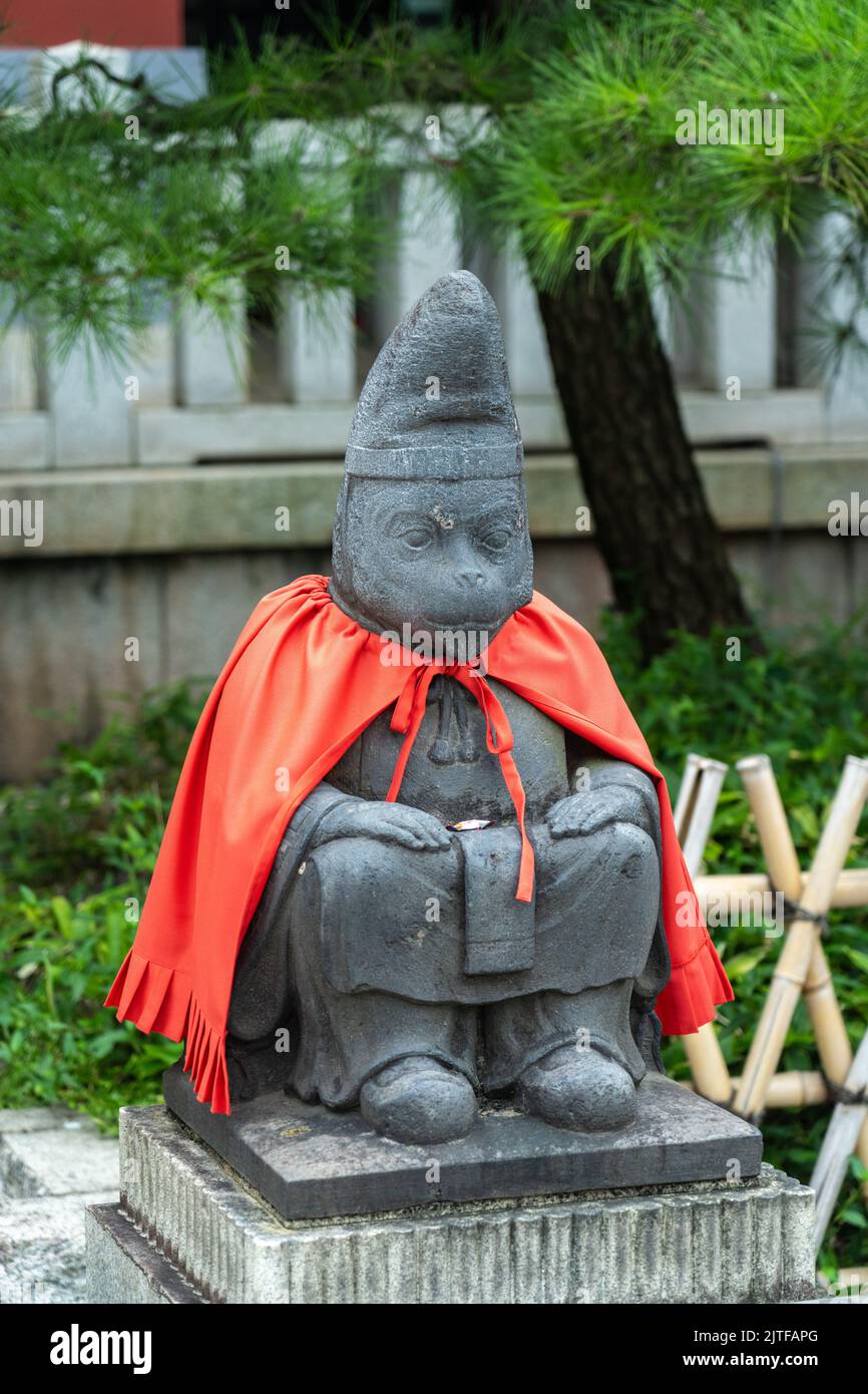 Masaru-kun, the monkey guardian at the Hie Jinja shrine in Nagatacho, Chiyoda, Tokyo, Japan. The Shinto shrine is one of the three major shrines of Tokyo. Stock Photo