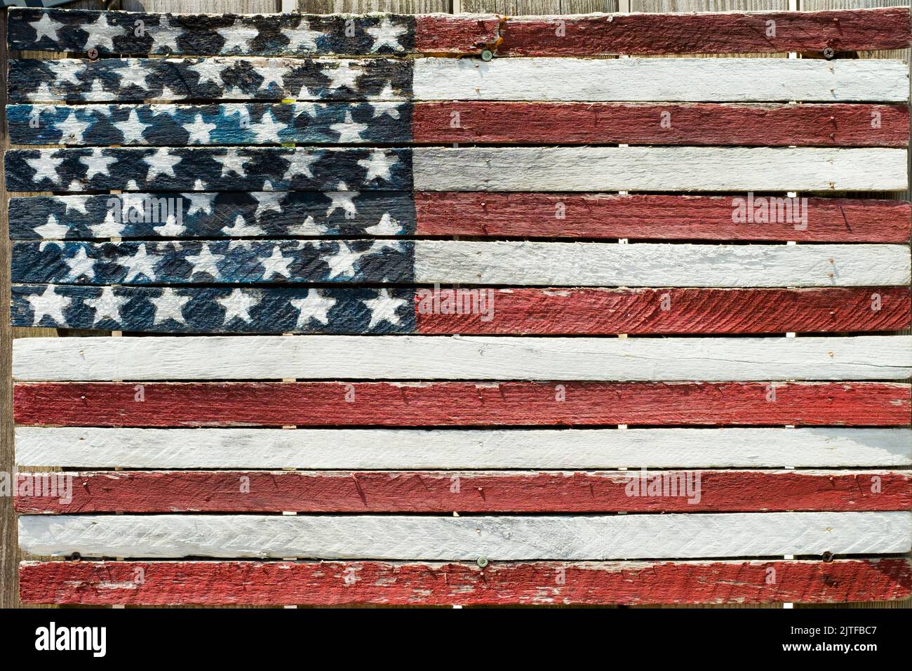 Fire Island, New York. Painted rustic Amercian flag. Stock Photo