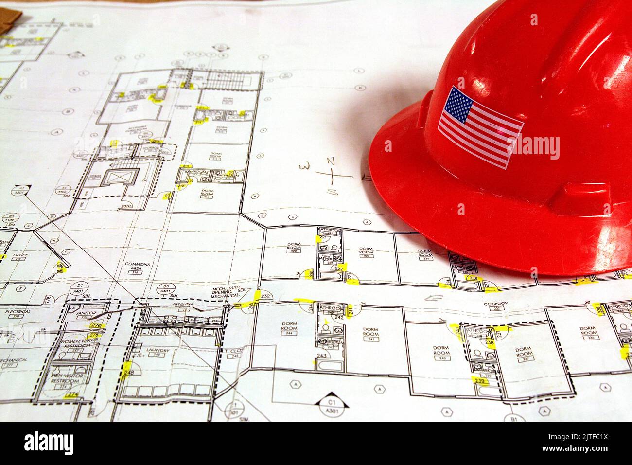Blueprints and helmet for construction project Stock Photo - Alamy