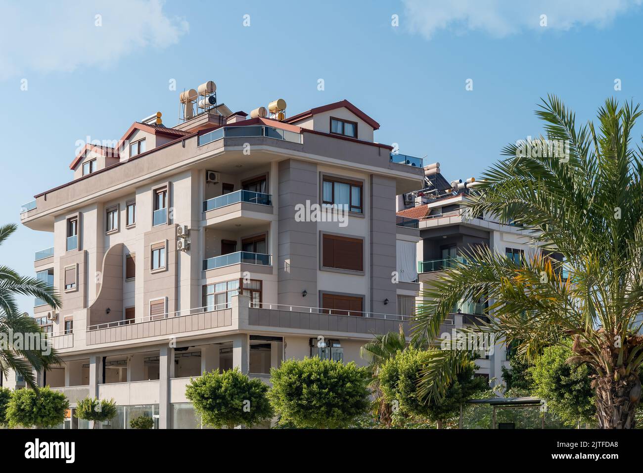 The exterior of an apartment building against the sky. Residential real