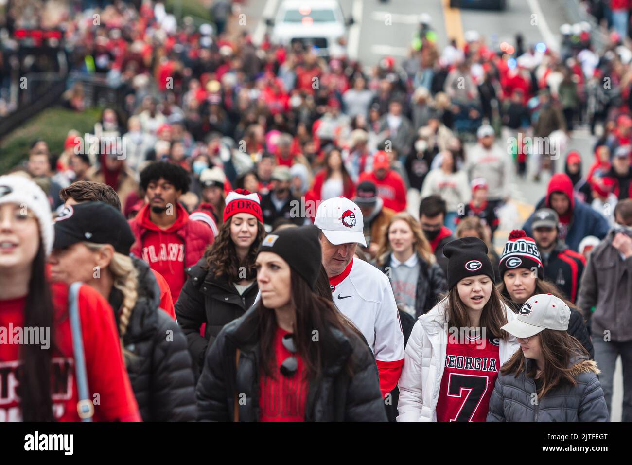 ATHENS, GA - JANUARY 15, 2022: Thousands of UGA fans gather on Lumpkin Street at Georgia's football National Championship victory parade. Stock Photo