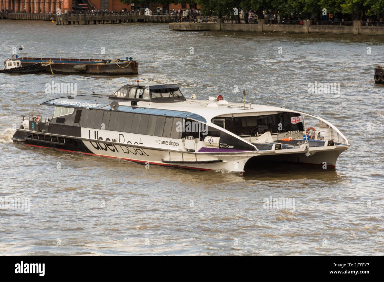 Closeup of The Typhoon Clipper a Thames Clipper Uber Boat on the River Thames, London, England, UK Stock Photo