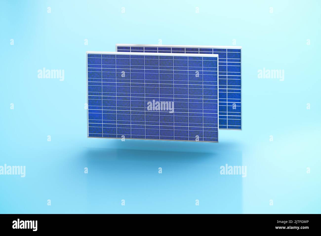 Solar engery with solar panels concept. Two solar panels hovering over a blue background. Horizontal orientation, selective focus Stock Photo
