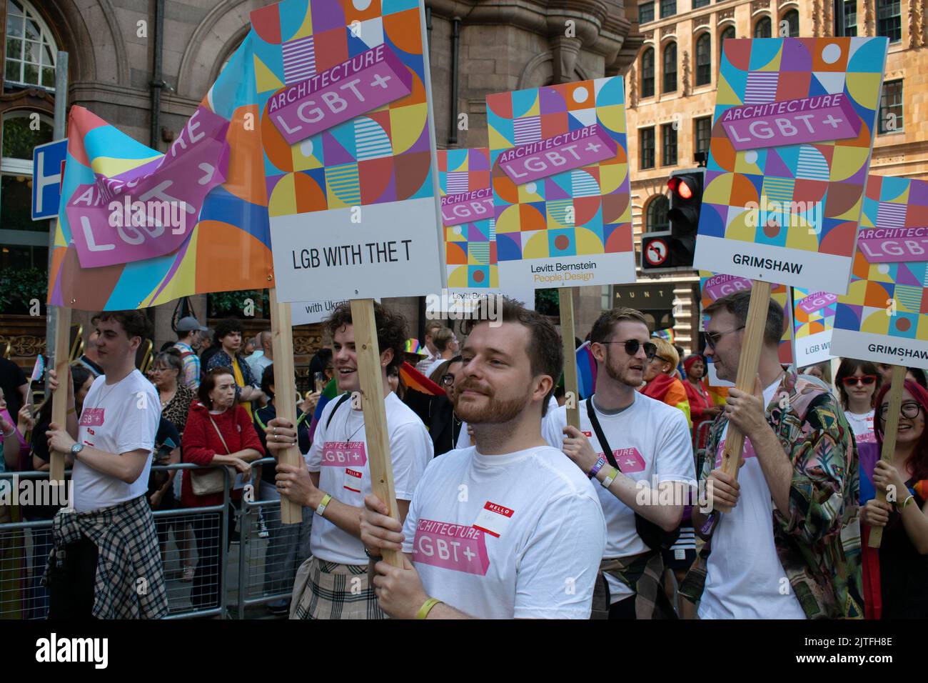 Manchester UK. August 27, 2022. Manchester Pride parade. Architects with sign text Architecture LGBT+ . Theme March for Peace. Stock Photo