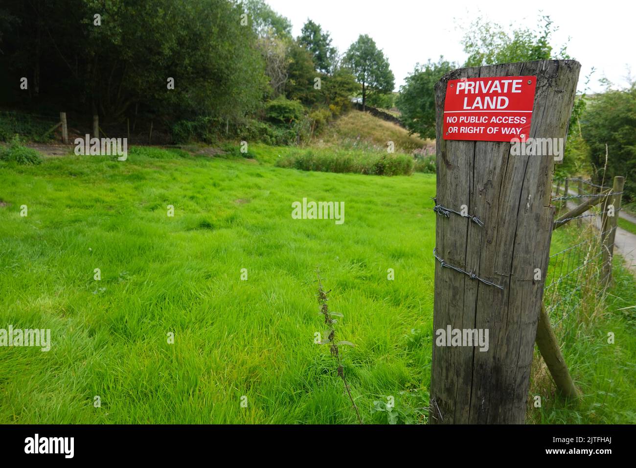 A notice indicating Private Land on a farm in Birch Vale, Derbyshire