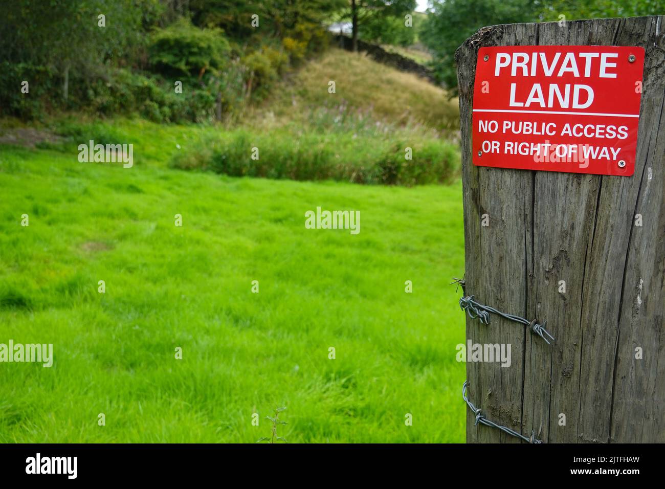 A notice indicating Private Land on a farm in Birch Vale, Derbyshire