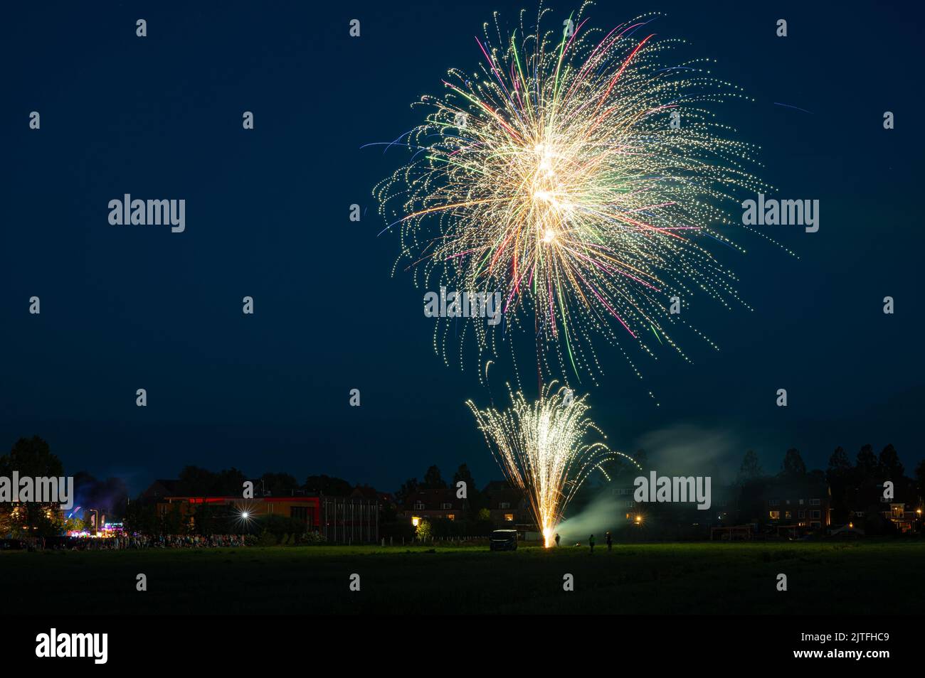 Fireworks are set off on a field during a festival Stock Photo - Alamy