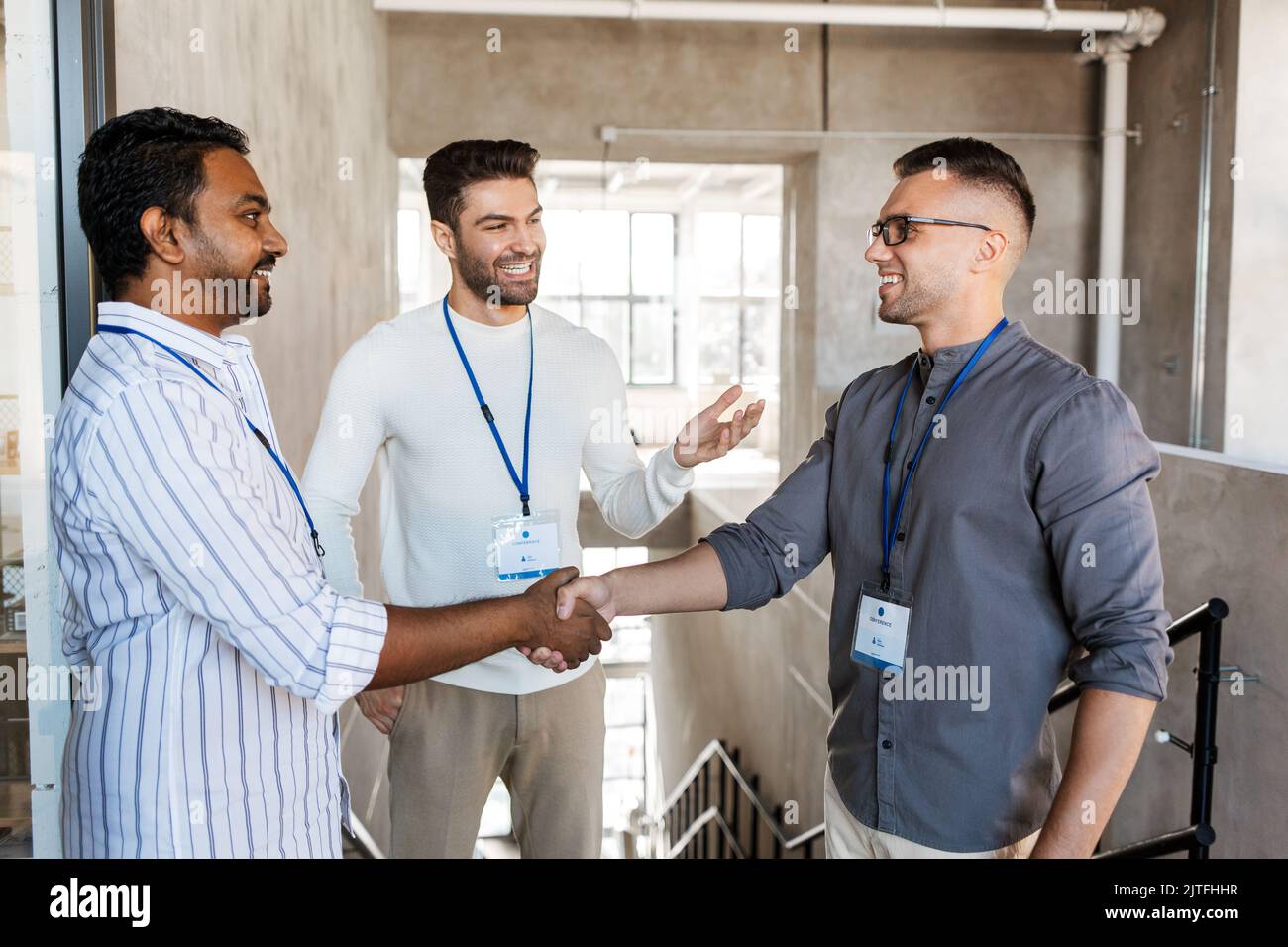 happy businessmen making handshake at office Stock Photo