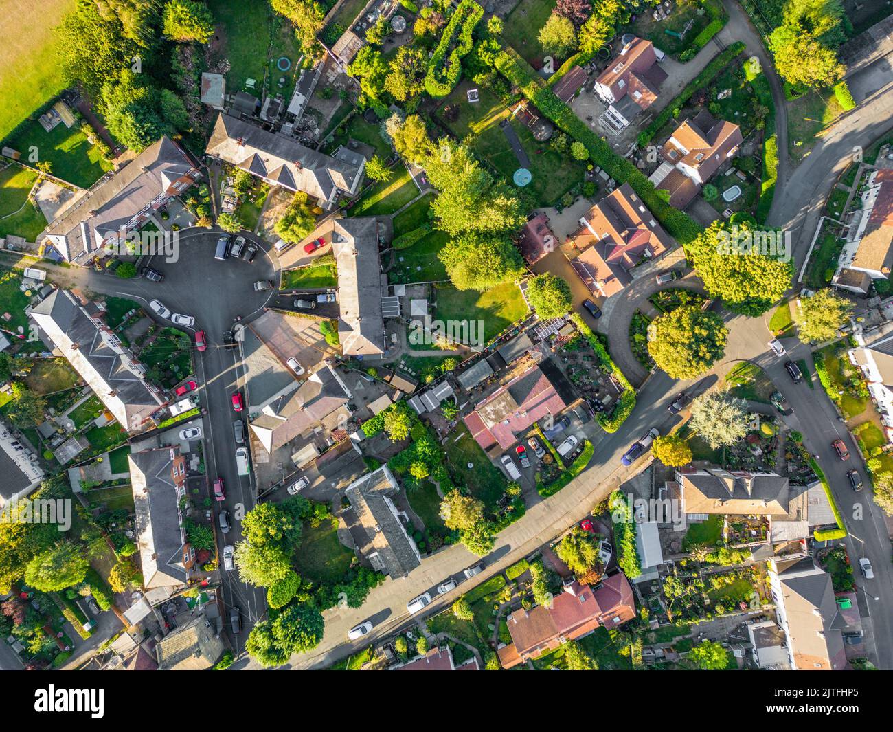 Aerial drone shot of residential property , houses and gardens in the village of Pool in Wharfedale, West Yorkshire Stock Photo
