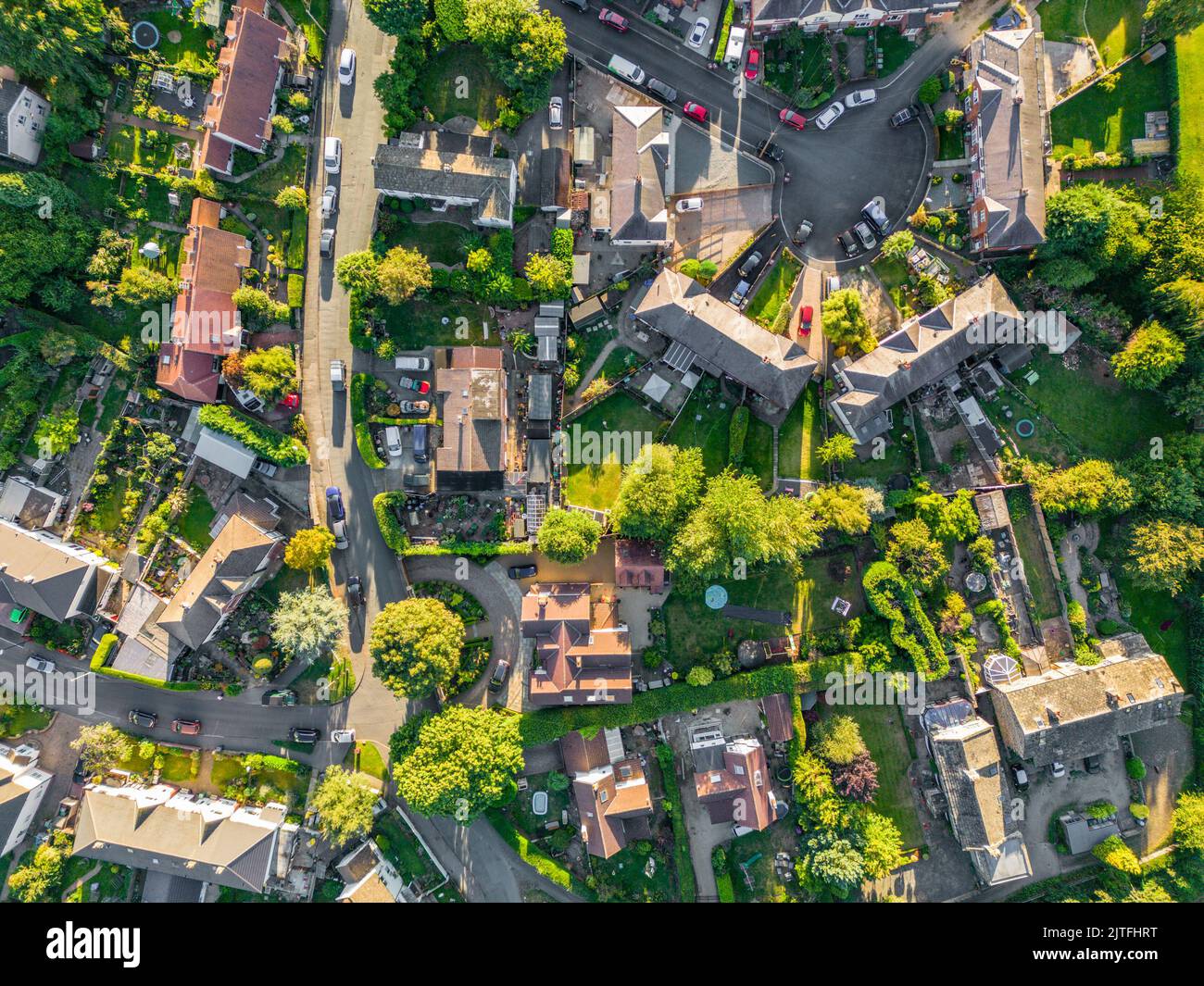 Aerial drone shot of residential property , houses and gardens in the village of Pool in Wharfedale, West Yorkshire Stock Photo