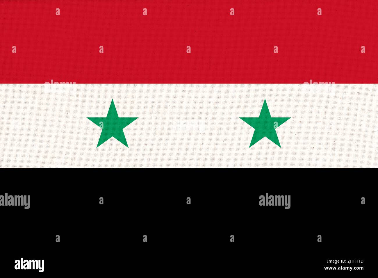 Flag of Syria. Syrian flag on fabric texture. National symbol of Syria. Syrian Arab Republic Stock Photo