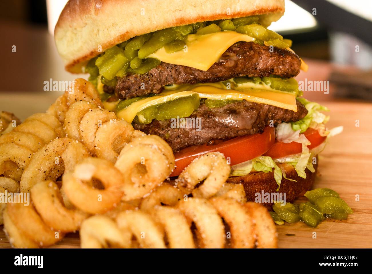 Twister's green chile double cheeseburger Stock Photo Alamy