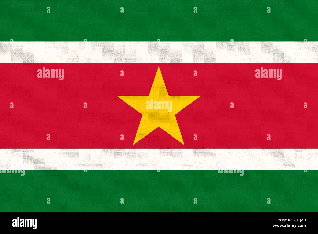 Flag of Suriname. Surinamese flag on fabric surface. Fabric Texture. National symbol. Republic of Suriname. Surinamese national flag Stock Photo