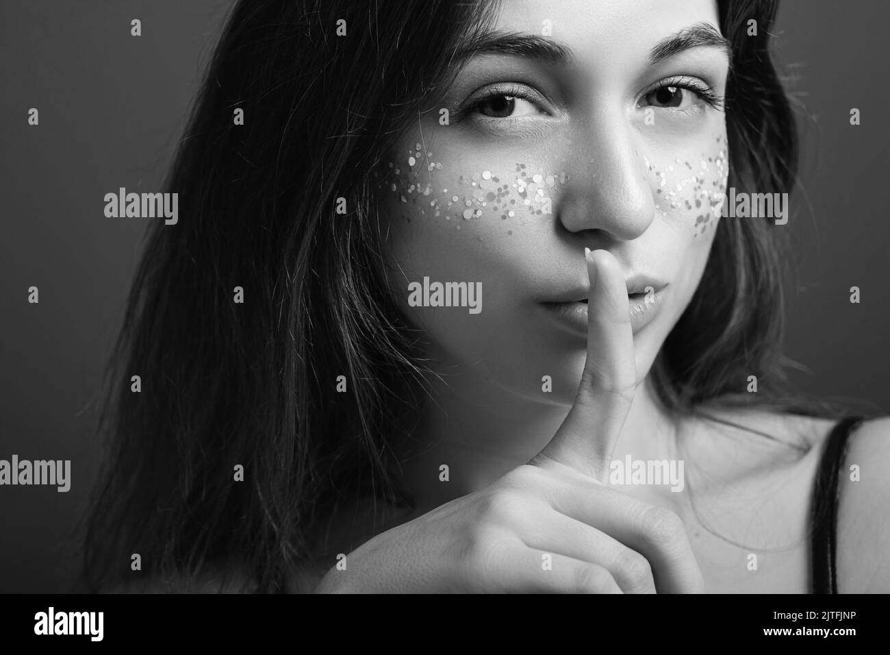 shush secret female finger lips sly expression Stock Photo - Alamy