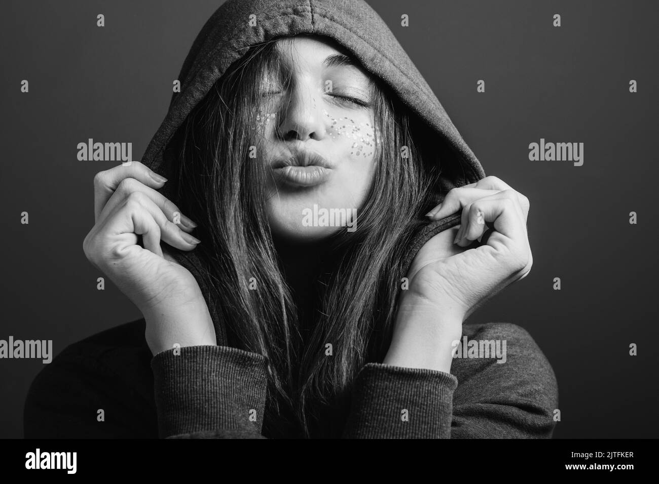 happy youth affection young woman blowing kiss Stock Photo