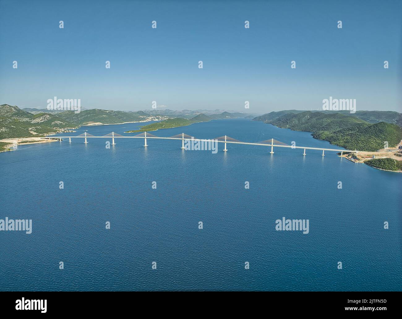 Aerial view of the Peljesac bridge at dusk Stock Photo