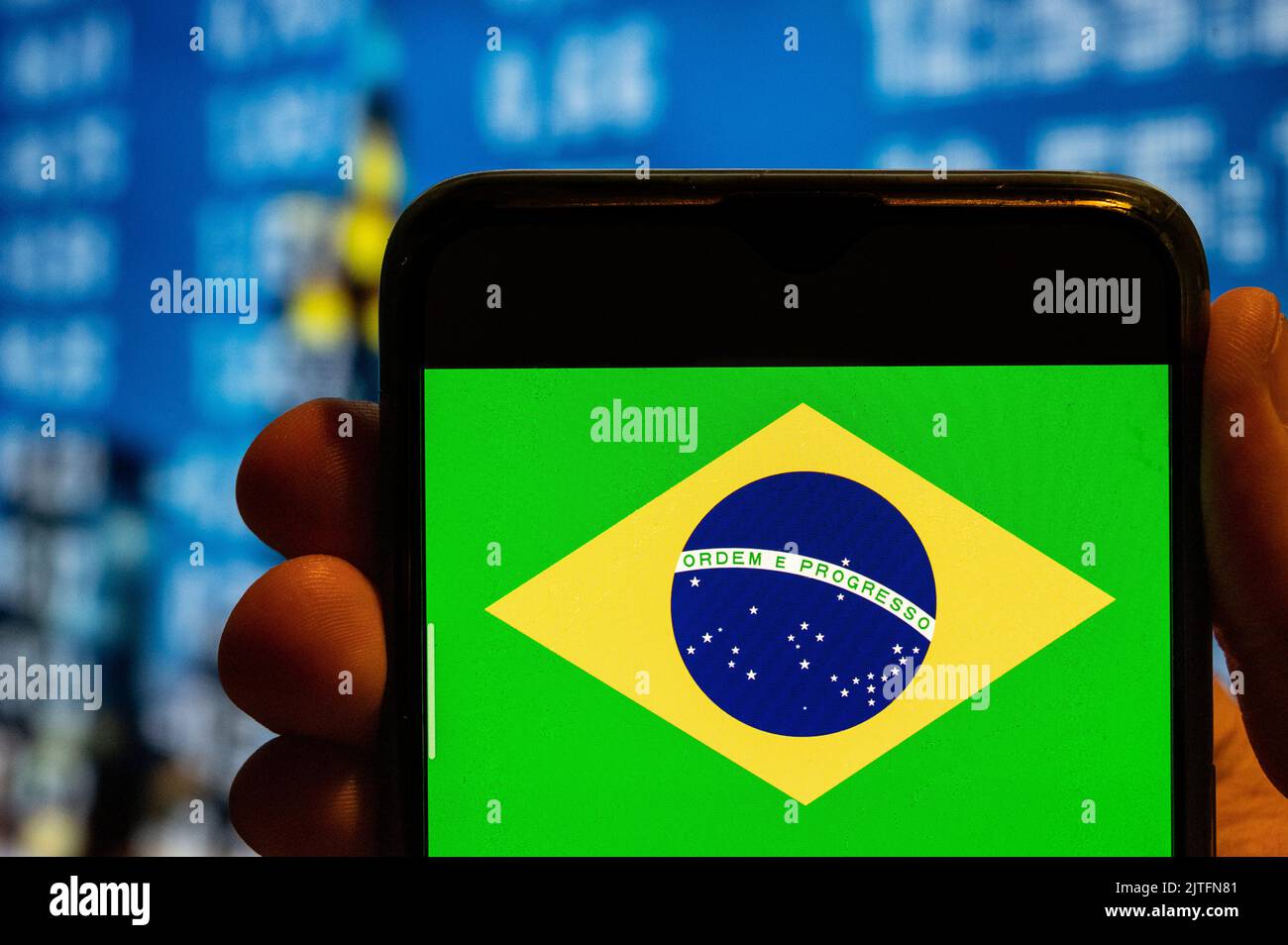 In this photo illustration, the Federal Republic of Brazil flag is ...