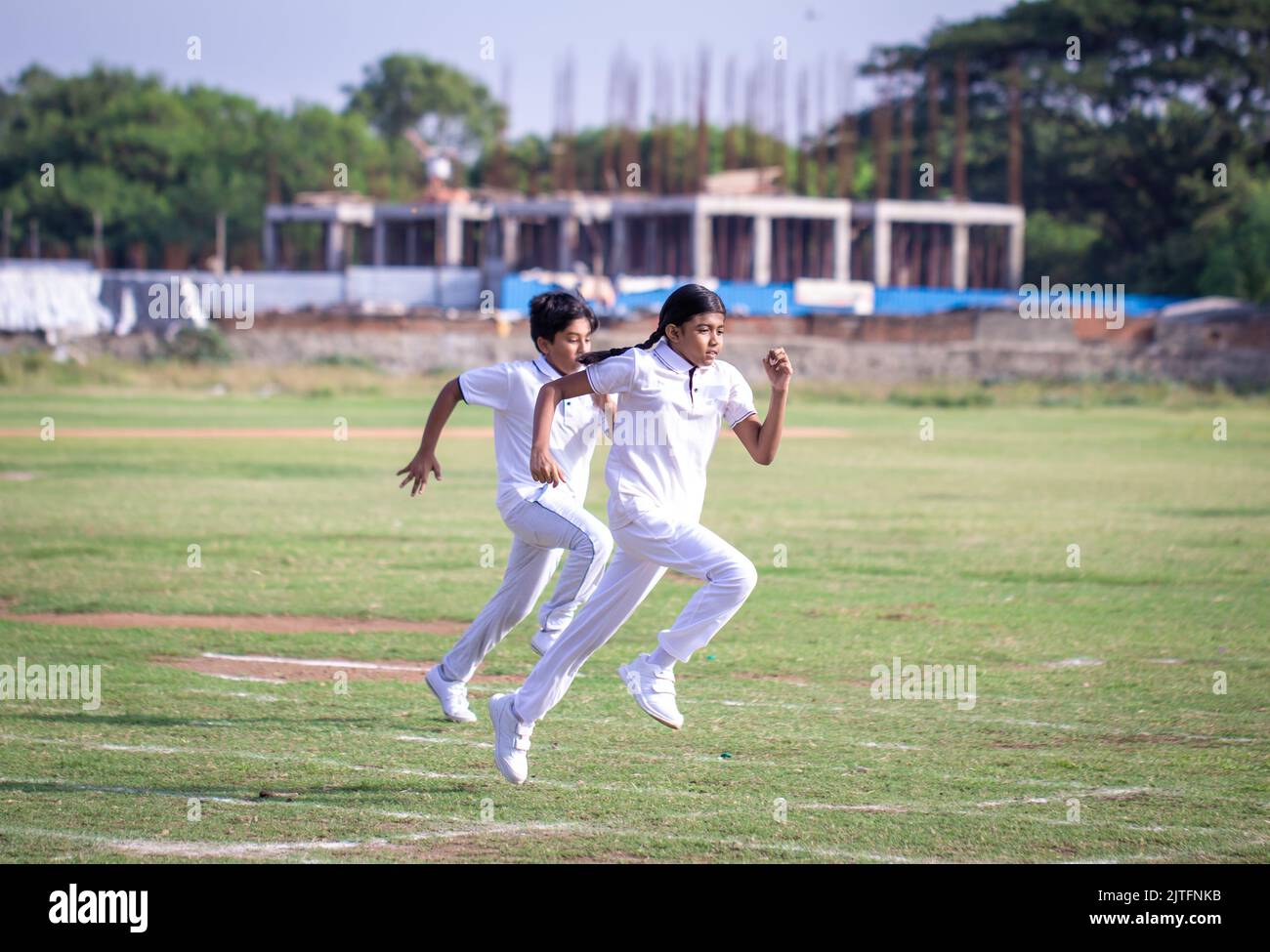 Chennai, Tamil Nadu, India - August 26, 2022: School kids running the 100 meters race during sports day event. Annual sports day celebration of school Stock Photo