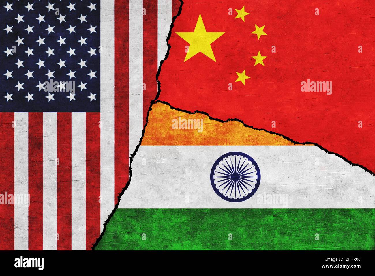 USA, India and China painted flags on a wall with a crack. United States of America, China and India relations Stock Photo