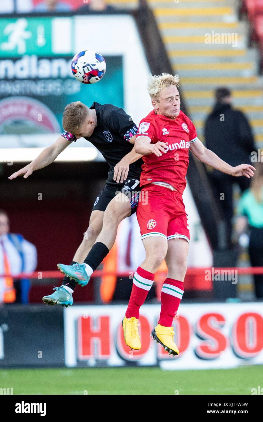 Regan Clayton of West Ham U-21 and Walsall«s Liam Bennett battle for the ball during the EFL Trophy match between Walsall and West Ham United at the Banks's Stadium, Walsall on Tuesday 30th August 2022. (Credit: Gustavo Pantano | MI News) Credit: MI News & Sport /Alamy Live News Stock Photo