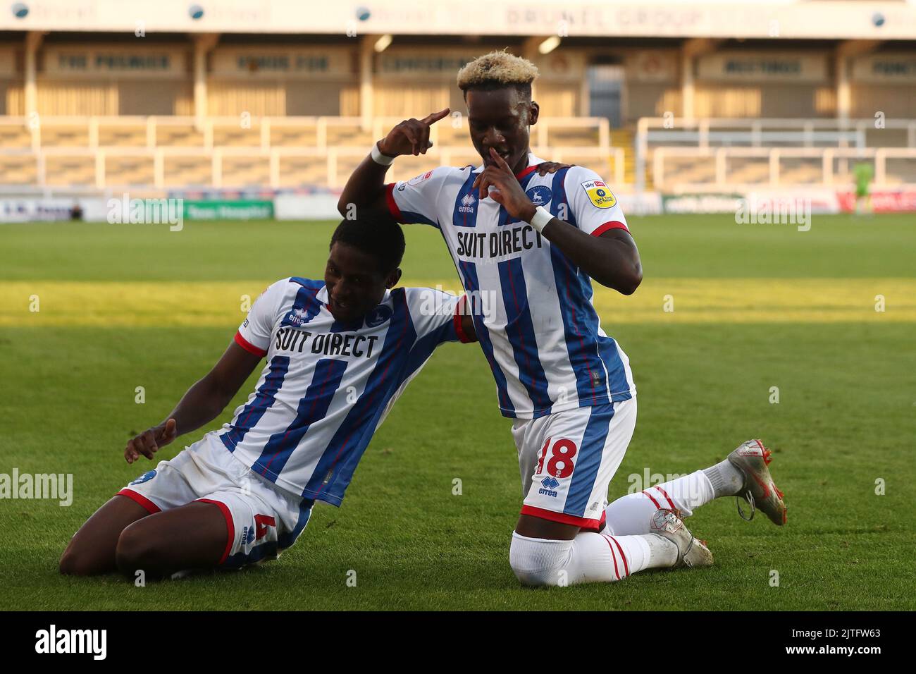 Hartlepool United's Mikael Ndjoli celebrates with Mouhamed Niang after scoring his and their second goal during the Papa John's EFL Trophy match between Hartlepool United and Harrogate Town at Victoria Park, Hartlepool on Tuesday 30th August 2022. (Credit: Mark Fletcher | MI News) Credit: MI News & Sport /Alamy Live News Stock Photo