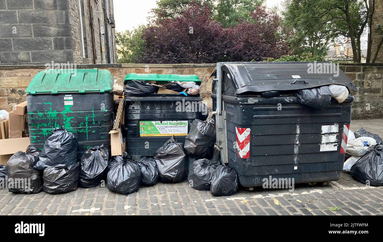 Edinburgh Bin Strikes, waste bins overflowing into the streets with rubbish. Scotland Uk. 2022 Stock Photo