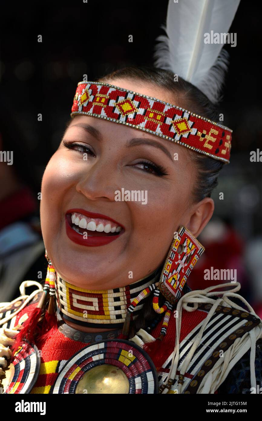 Clothes Making Contest A Native American woman competes in the Native American Clothing ...
