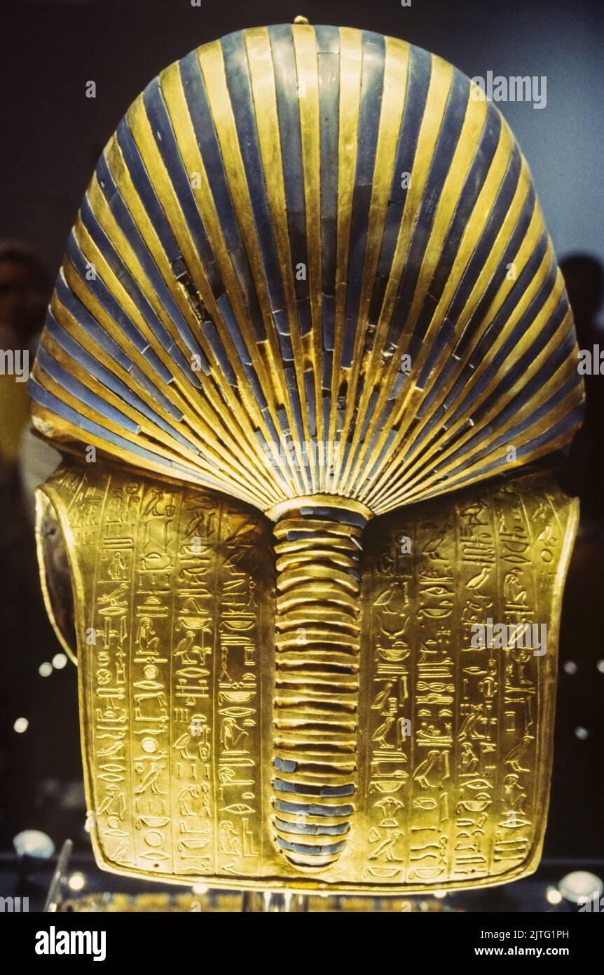 Tutankhamun mask of gold in Cairo Museum, rear view with hieroglyphics Stock Photo