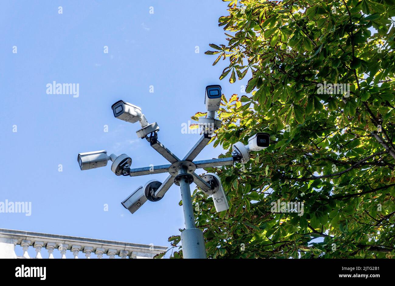 Big brother is watching you. A group of six cctv cameras watching all aspects of an area. Stock Photo