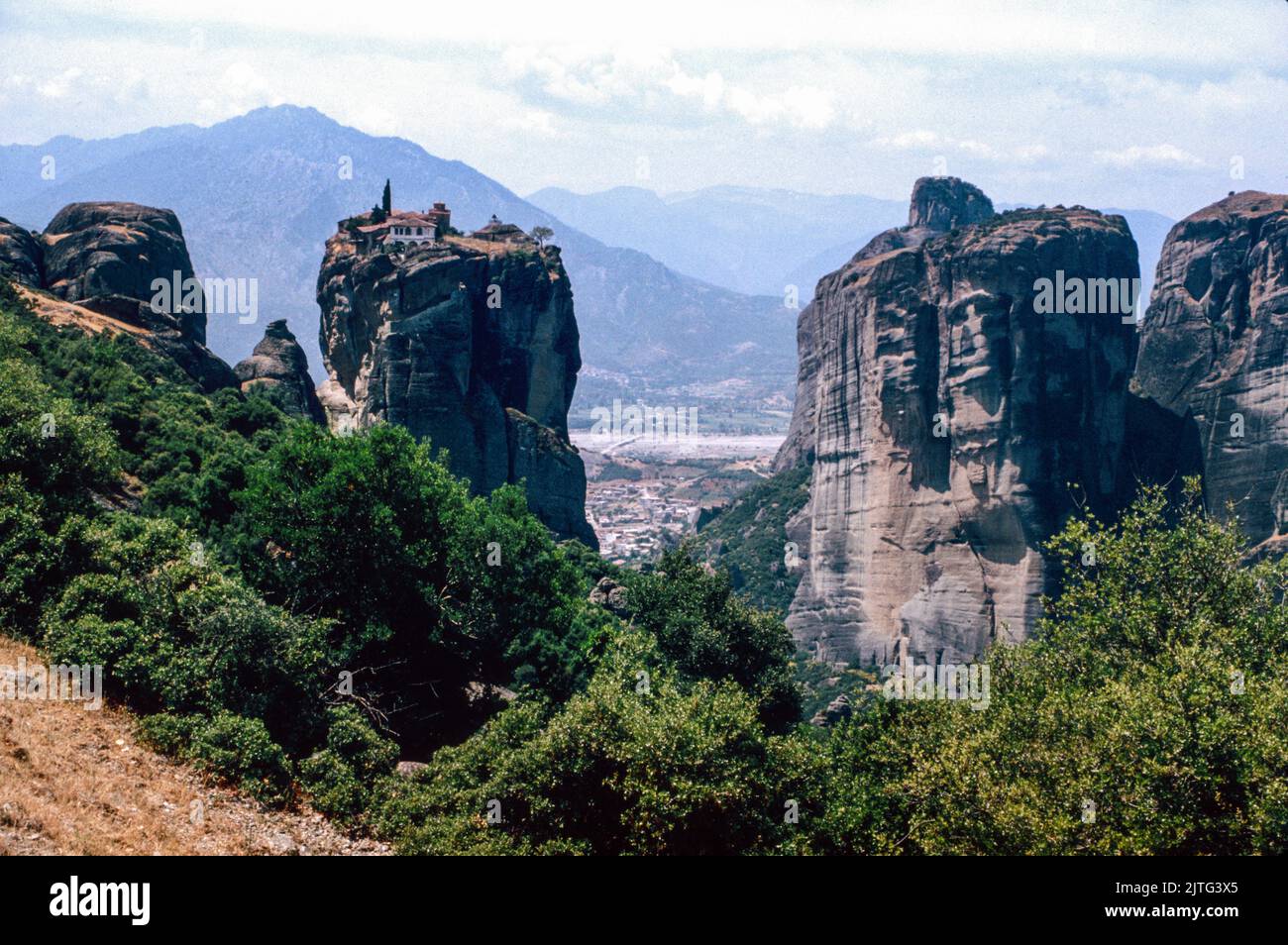 The Meteora - a rock formation in central Greece hosting one of the largest and most precipitously built complexes of Eastern Orthodox monasteries. March 1980. Archival scan from a slide. Stock Photo