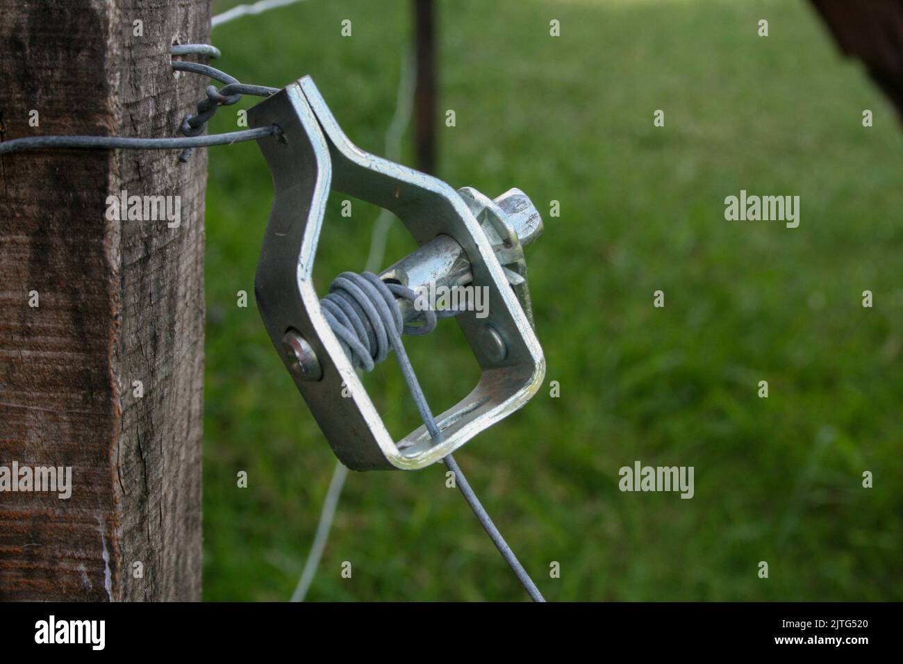 Galvanized iron wire tensioner Stock Photo Alamy