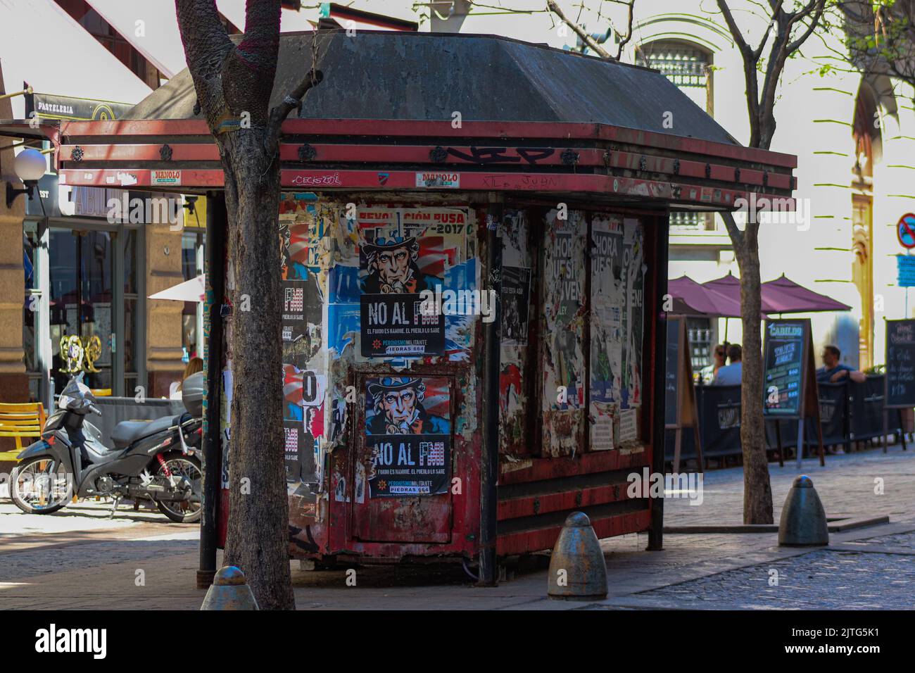 Newsstand papered with posters of protests against the IMF in Buenos Aires Stock Photo