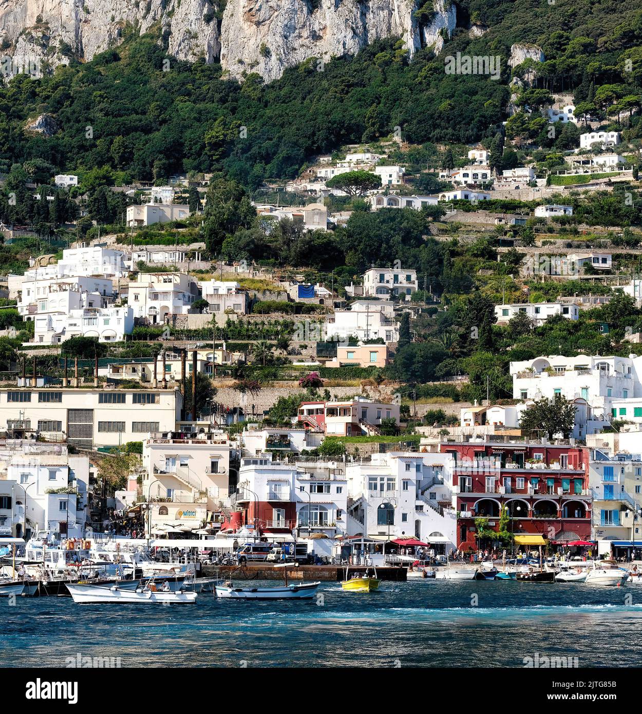 Capri, Campania, Italy, Naples. Panoramic view of the beautiful and famous Marina Grande with its colorful houses and many boats.  (1) Stock Photo