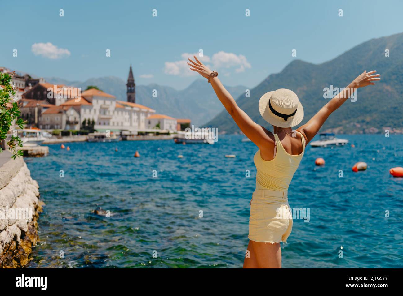 Summer photo shoot on the streets of Kotor, Montenegro. Beautiful girl